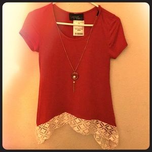 Beautiful red top with a necklace and lace